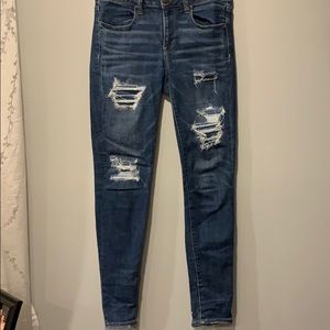 American Eagle dark wash jeggings with rips
